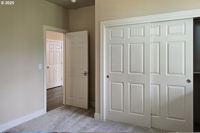 3404 River Heights Dr, Springfield, OR 97477 - unfurnished bedroom featuring carpet floors, baseboards, and a closet