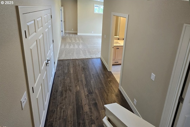 3404 River Heights Dr, Springfield, OR 97477 - hallway featuring baseboards and dark wood-type flooring