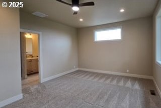 3404 River Heights Dr, Springfield, OR 97477 - unfurnished bedroom featuring carpet floors, baseboards, and recessed lighting