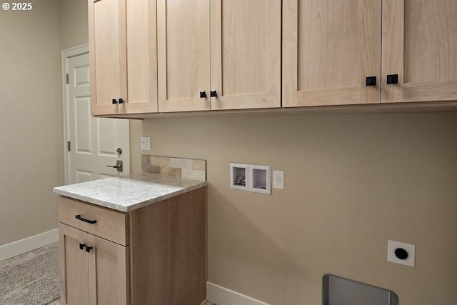 3404 River Heights Dr, Springfield, OR 97477 - laundry area featuring cabinet space, baseboards, hookup for an electric dryer, and washer hookup