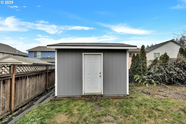 view of outdoor structure with a lawn