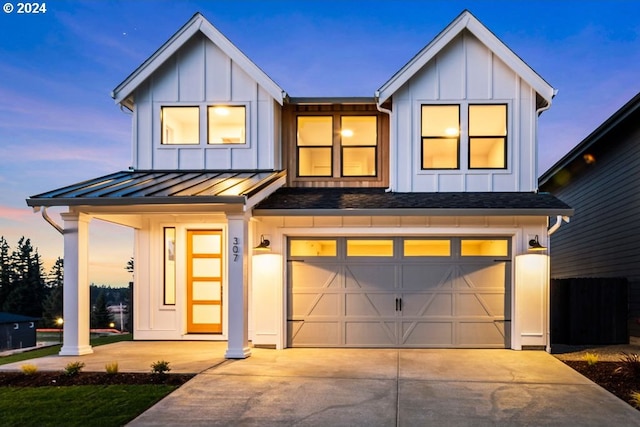 modern farmhouse style home with a garage