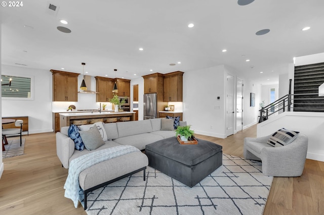 living room with light hardwood / wood-style floors