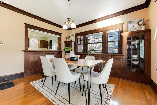 kitchen with white dishwasher, dark wood-type flooring, and sink