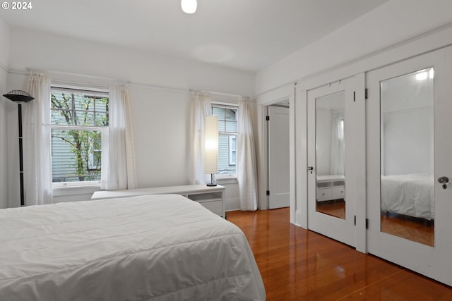 bedroom featuring hardwood / wood-style floors