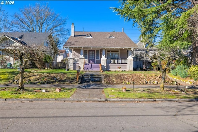 view of front of house with covered porch