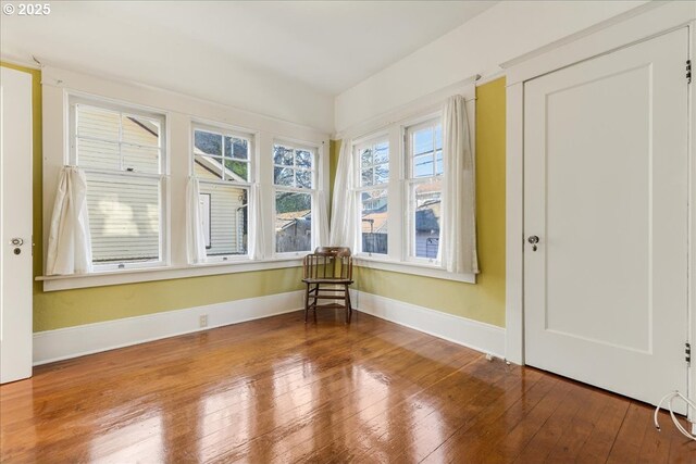 bedroom with hardwood / wood-style floors