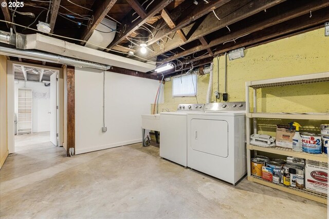 basement with washer and clothes dryer