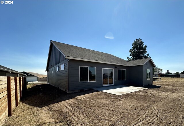 rear view of house featuring a patio area