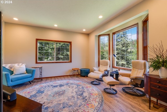 sitting room with recessed lighting, wood finished floors, and baseboards