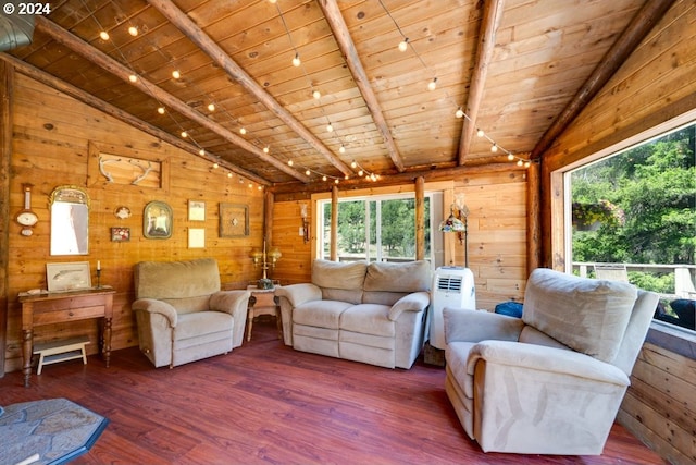 living room with wooden walls, wood ceiling, lofted ceiling with beams, and wood finished floors