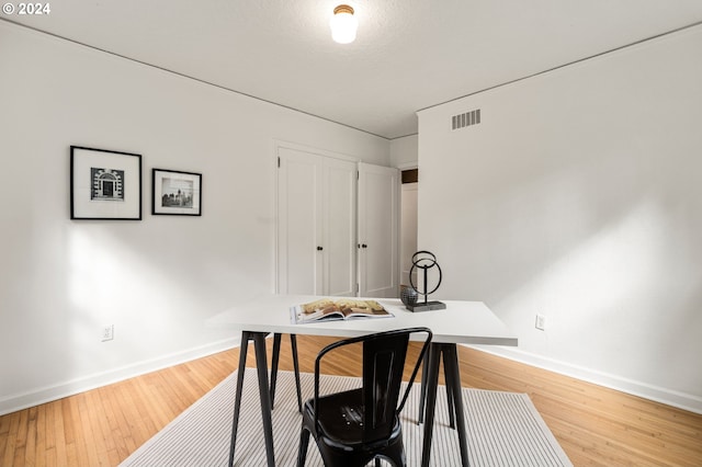 office space featuring hardwood / wood-style flooring