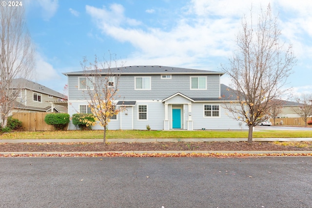 front of property featuring a front lawn