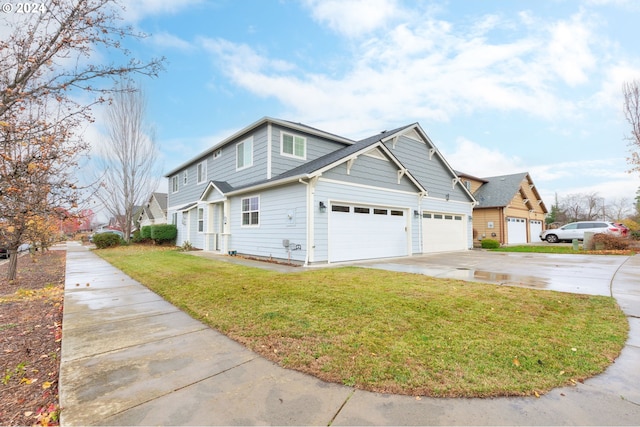 exterior space featuring a garage and a lawn