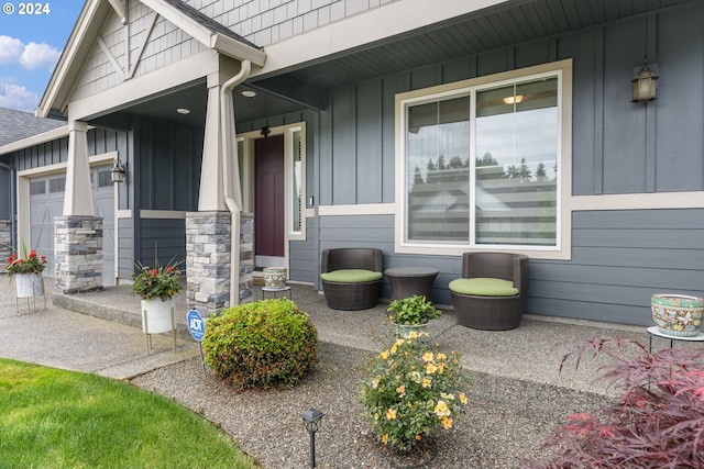 doorway to property with a garage