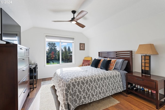 bedroom featuring lofted ceiling, hardwood / wood-style floors, and ceiling fan