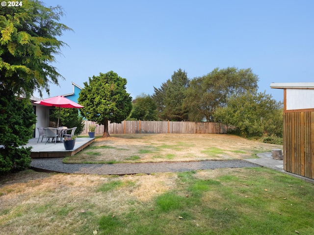 view of yard with a deck