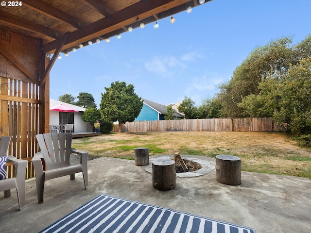 view of patio / terrace featuring a fire pit