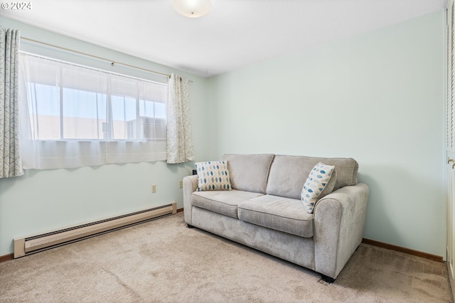 living room featuring light carpet and a baseboard radiator