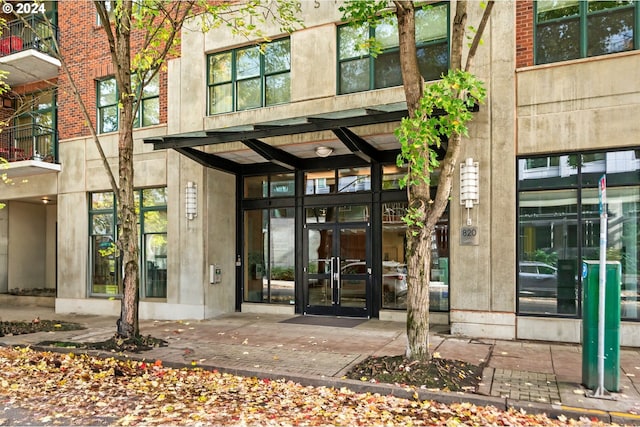 entrance to property featuring french doors