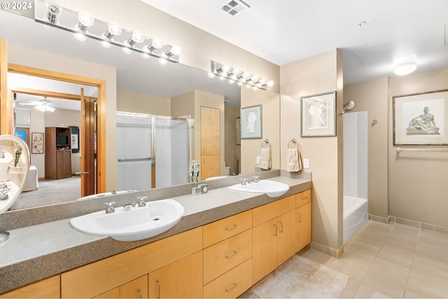 bathroom with vanity, ceiling fan, tile patterned flooring, and plus walk in shower