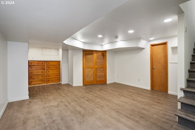 basement with light wood-type flooring