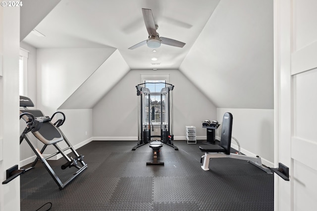 workout area featuring vaulted ceiling and ceiling fan