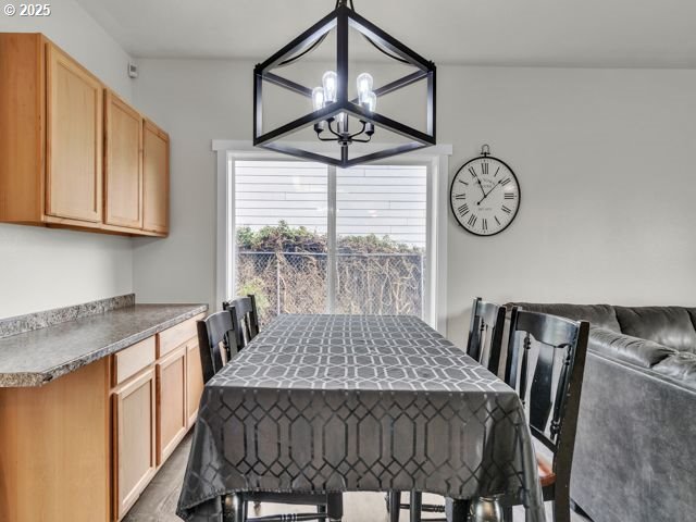 724 Kayla Way, Monmouth, OR 97361 - dining room featuring a notable chandelier