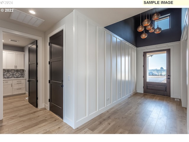 foyer featuring light wood-type flooring