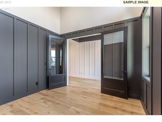 foyer with light hardwood / wood-style flooring