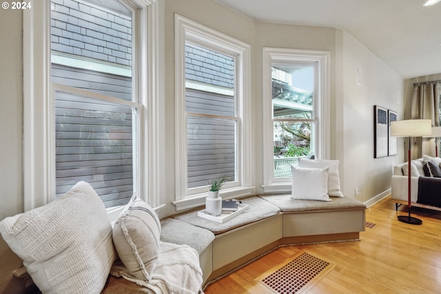 sitting room with light hardwood / wood-style flooring