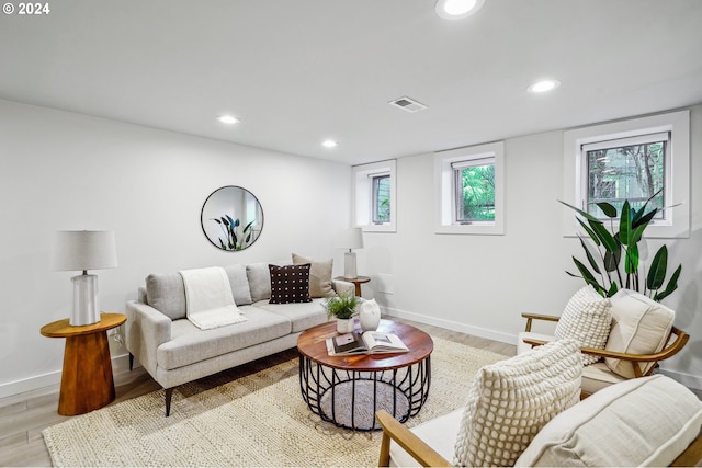 living room with light hardwood / wood-style floors