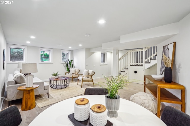 dining space with light hardwood / wood-style floors