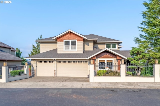 view of front of property with a garage