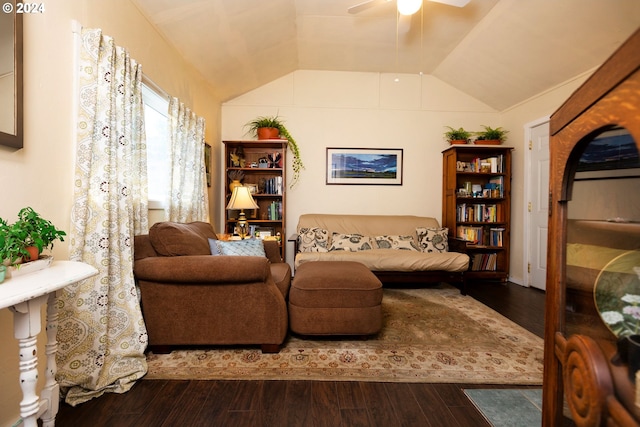 sitting room featuring lofted ceiling, wood finished floors, and a ceiling fan