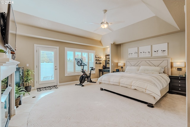 tiled bedroom featuring lofted ceiling, access to exterior, and ceiling fan