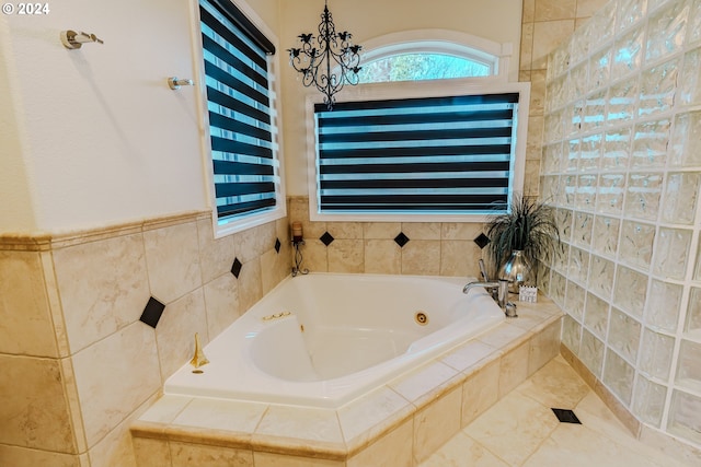 bathroom featuring a relaxing tiled tub