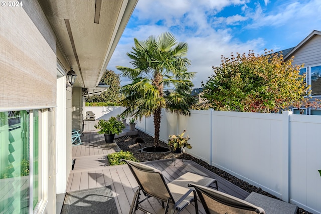 view of patio with a wooden deck