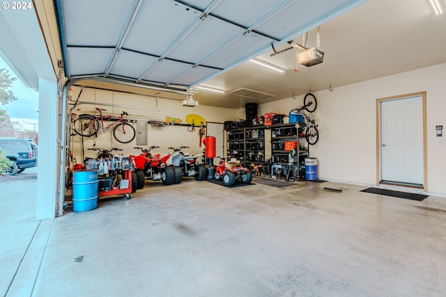 garage featuring a garage door opener