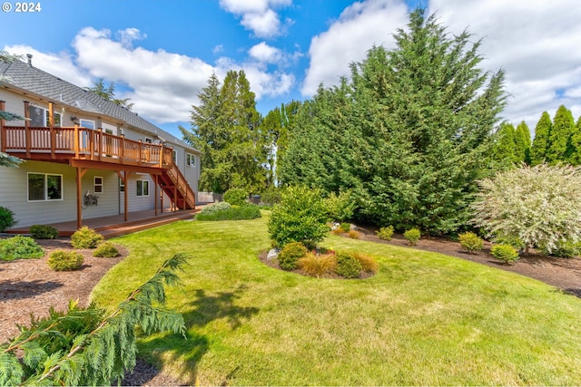 view of yard with a deck