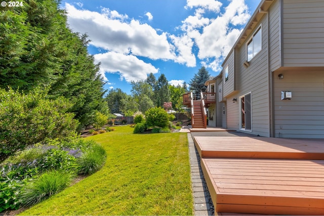 view of yard featuring a deck