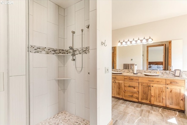 6150 NW Kingwood Ave, Redmond, OR 97756 - ensuite bathroom with a tile shower and double vanity