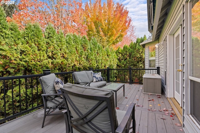 wooden deck featuring an outdoor living space