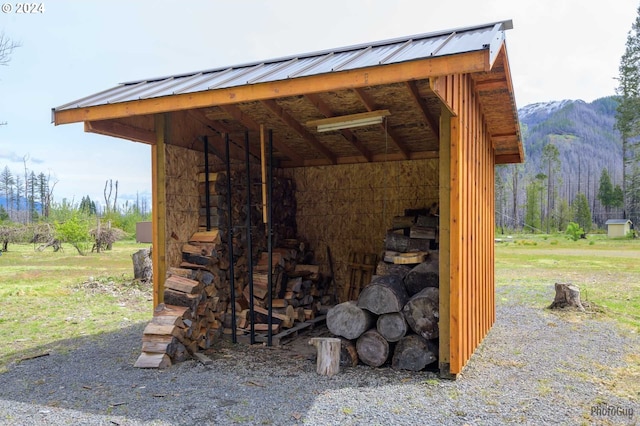 view of outdoor structure with a mountain view