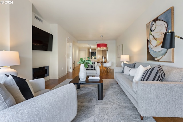 living room with wood-type flooring