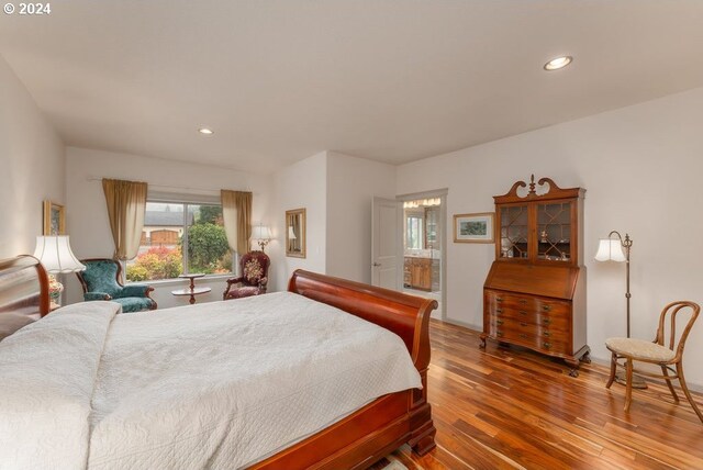 bedroom featuring hardwood / wood-style flooring