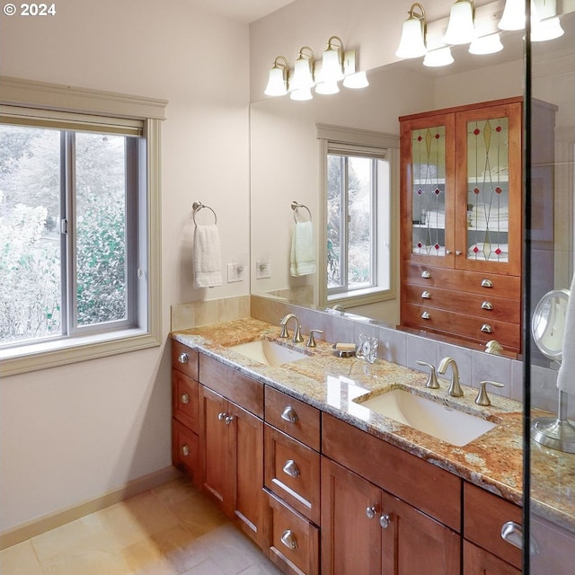 bathroom with vanity and tile patterned floors