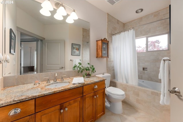 full bathroom with tile patterned floors, vanity, toilet, and shower / bathtub combination with curtain