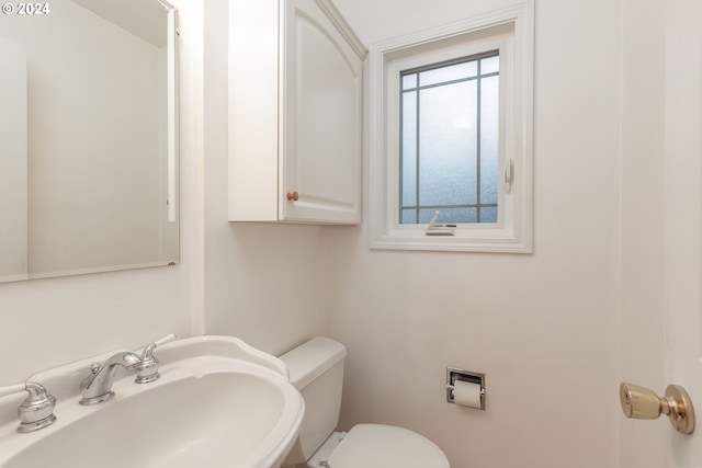 bathroom with sink and toilet