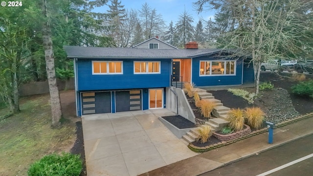 view of front of property with a garage